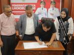 Wali-Kota-Lhokseumawe-Sayuti-Abubakar-SH-MH-bersama-Rektor-Universitas-Al-Muslim.jpg