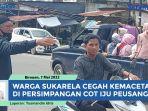 Warga-Sukarela-Cegah-Kemacetan-di-Persimpangan-Cot-Iju-Peusangan-Bireuen.jpg