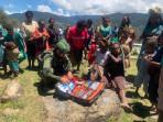 Yonif-113JS-memberikan-pelayanan-kesehatan-gratis-kepada-masyarakat-Papua.jpg