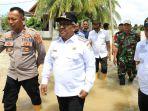 berkunjung-ke-lokasi-banjir-di-sejumlah-desa-dalam-kecamatan-Matangkuli-Aceh-Utara.jpg