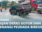 hujan-lebat-air-meluap-ke-jalan-lintas-nasional-kawasan-peudada.jpg