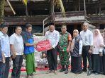kadissos-nagan-raya-menyerahkan-bantuan-kepada-dayah-di-beutong-ateuh-senin-3172023.jpg