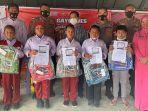 Siswa SD Gayo Lues Mulai Ikuti Vaksinasi Covid-19, Kapolres Berikan Hadiah