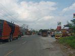 kendaraan-antrean-di-spbu-blang-muko-nagan-raya-rabu-23112022.jpg