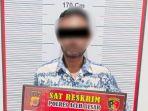 mantan-keuchik-piyeung-lhang-kecamatan-montasik-aceh-besar-ad-ditahan-di-mapolres-aceh-besar.jpg