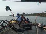 massa-naik-boat-ke-Pulau-Panjang.jpg