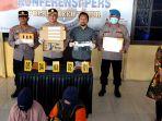 memperlihatkan-senjata-api-yang-diamankan-dari-dalam-lapas-idi-beserta-tersangka.jpg