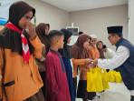 menyantuni-anak-yatim-dalam-kegiatan-Mahkamah-Agung-Peduli.jpg