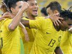 para-pemain-timnas-malaysia-berselebrasi-saat-mencetak-gol-ke-gawang-thailand.jpg