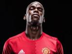 paul-pogba-resmi-berseragam-manchester-united_20160810_102519.jpg