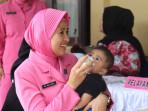 pemeriksaan-kesehatan-gratis-serta-Posyandu-bagi-balita-di-klinik-polresta.jpg
