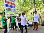 pj-bupati-aceh-besar-melakukan-aksi-bersih-bersih-pantai-di-kawasan-pantai-lampuuk-aceh-besar.jpg