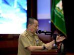 pj-gubernur-aceh-achmad-marzuki-saat-membuka-musrenbang-aceh-tahun-2023.jpg
