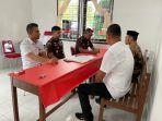 polres-aceh-besar-menyerahkan-barang-bukti-dan-tersangka-kasus-dugaan-korupsi-dana-desa-eks.jpg