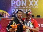 rahmad-dwi-kurniawan-berhasil-meraih-medali-perunggu-di-cabang-wushu-di-pon-xx-papua-2021.jpg
