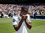 vinicius-junior-diperkenalkan-sebagai-pemain-baru-real-madrid_20180723_122450.jpg