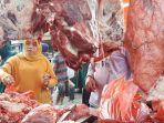 warga-membeli-daging-meugang.jpg