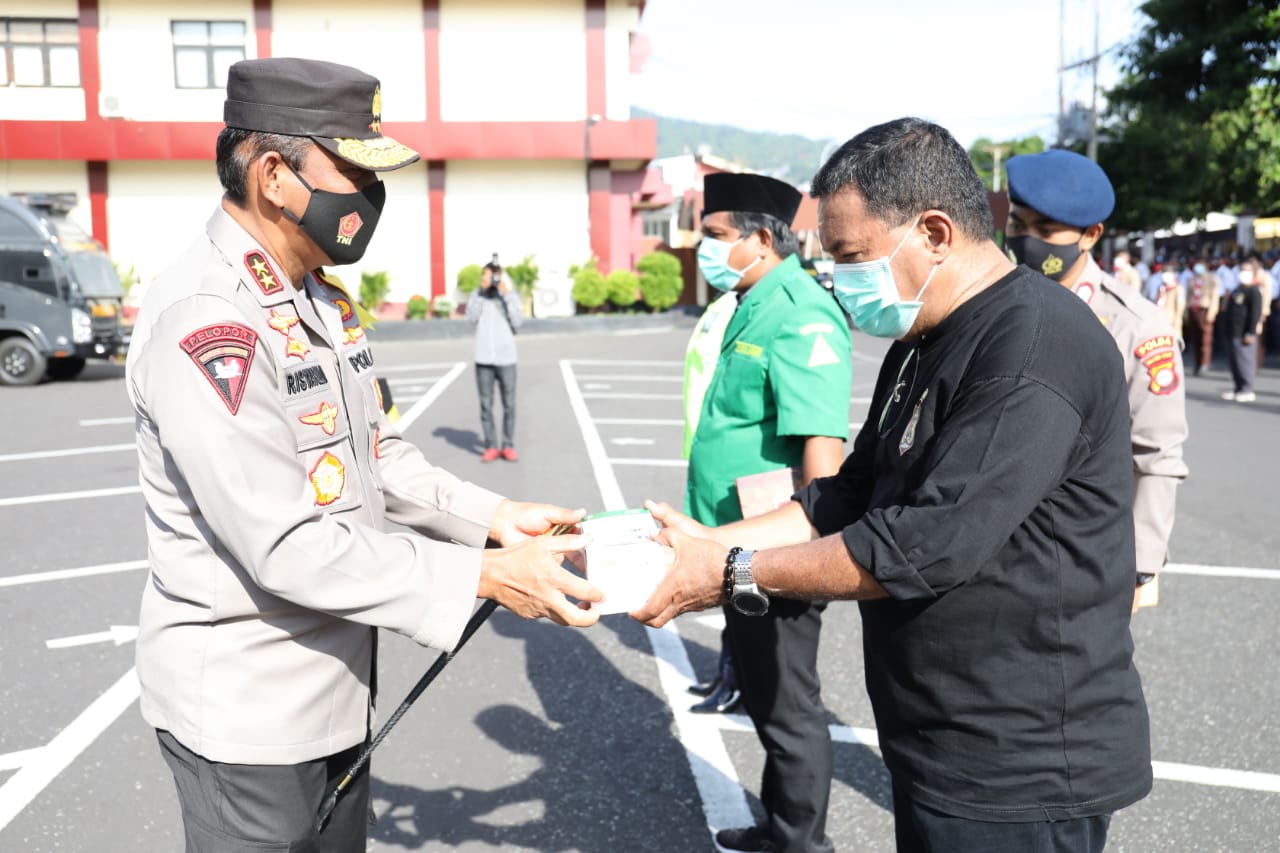 Apel Pendisiplinan Protokol Kesehatan, Polda Maluku Utara Bagikan 10 Ribu Masker ke Komunitas