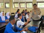 Kapolres SBT Tebar Motivasi, Santuni Pelajar Yatim Piatu di SMA 1 SBT