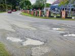 jalan-bandara-rusak.jpg