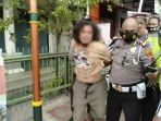 pria-yang-memukul-polisi-di-jalan-kyai-mojo.jpg