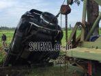 proses-evakuasi-mobil-milik-sunyoto-yang-terjun-ke-sungai.jpg