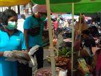 ribuan-pedagang-di-pasar-mardika-dapat-masker-gratis.jpg