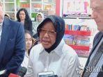 tri-rismaharini-timbun-masker.jpg