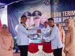 PISAH-SAMBUT-Kalapas-Tanjungpandan-sebelumnya-Gowin-Mahali-kanan.jpg