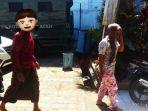petugas-wh-kota-banda-aceh-menggiring-pasangan-selingkuh-yang-digerebek-warga-cot-mesjid.jpg