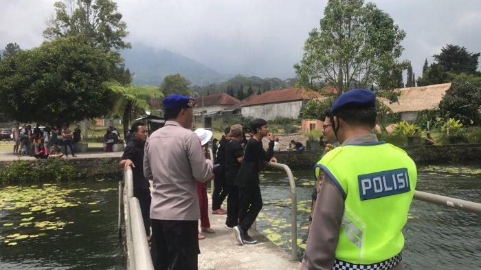 Angin Sedikit Kencang dan Gerimis, Satpolairud Polres Tabanan Patroli di Ulun Danu dan Tanah Lot