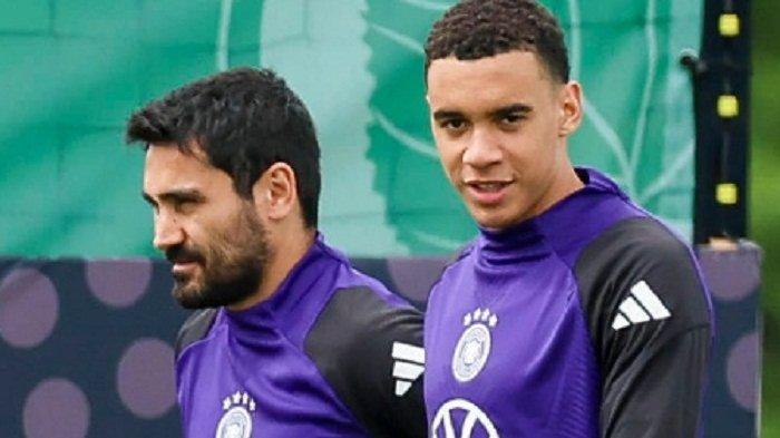 Dua-pemain-Timnas-Jerman-Ilkay-Gundogan-kiri-bersama-rekannya.jpg