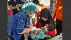 Pelaksanaan-imunisasi-campak-di-Dusun-Wanasari-Denpasar.jpg