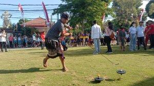 Salah-satu-siswa-saat-mengikuti-permainan-tradsional-megangsing.jpg