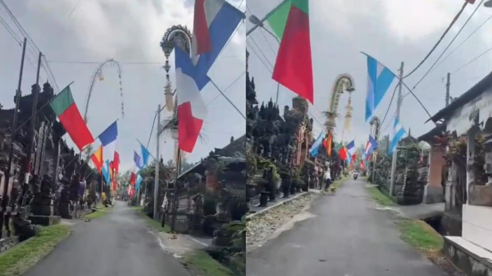 BIKIN BANGGA! Semarak Bendera Piala Dunia Berpadu Penjor, Dusun Sama Griya Bali Viral - Tribun-bali.com