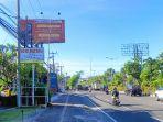 Baliho-sosialisasi-kepada-WNA-agar-mengikuti-aturan-dan-norma.jpg