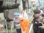 Dua-WNA-Rusia-yang-menjadi-muncikari-jaringan-internasional-digiring-di-Polres-Badung.jpg