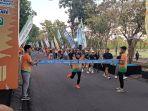 Gelar-Summer-QRIS-Run-2025-BI-Bali-Manfaatkan-Limbah-Uang.jpg