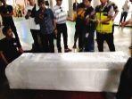 Jenazah-PMI-asal-Jembrana-Tiba-di-Rumah-Duka-Relawan-Dharma-Bantu-Fasilitasi.jpg