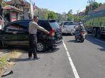 KECELAKAAN-Sebuah-mobil-Avansa-berwarna-hitam-mengalami-kecelakaan-di-Melaya.jpg