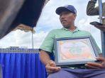 Lukman-Hakim-nelayan-Pantai-Pebuahan-saat-menceritakan-ihwal-penemuan-para-korban-KMP-98.jpg