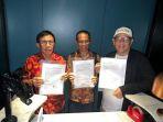 PWI-hasil-KLB-Zulmansyah-Sekedang-kanan-serta-anggota-Dewan-Pers-Dahlan.jpg