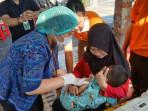 Pelaksanaan-imunisasi-campak-di-Dusun-Wanasari-Denpasar.jpg