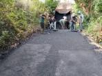Viral Warga Keluhan Aspal Tipis di Nusa Penida, Dinas PU Sebut Sempat Ada Kerusakan Alat
