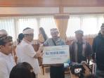 Penyerahan-santunan-kematian-BPJS-Ketenagakerjaan-di-Kantor-Wali-Kota-Denpasar.jpg