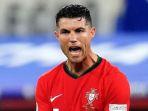 Penyerang-Portugal-Cristiano-Ronaldo-merayakan-seleberasi-bersama-timnya-setelah-mengalahkan-Ceko.jpg