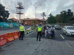 Persimpangan-Jalan-Airport-Ngurah-Rai-Mulai-Ditutup-Pengendara-Diminta-Ikuti-Aturan.jpg