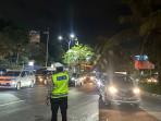 Personel-Polres-Kawasan-Bandara-I-Gusti-Ngurah-Rai-mengatur-arus-lalu-lintas.jpg