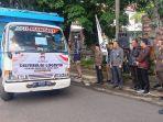 Polisi-Kawal-Distribusi-Logistik-Pilkada-2024-di-Jembrana-2-TPS-Dipindah-Karena-Alasan-Tertentu.jpg