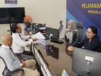 SIDANG-Kuasa-Hukum-GA-dan-WA-saat-lapor-kehadiran-di-bagian.jpg